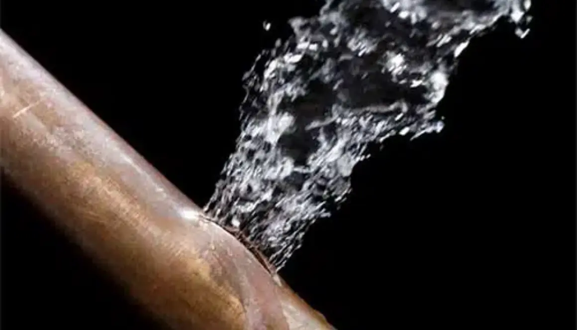 How can heavy rain affect plumbing?